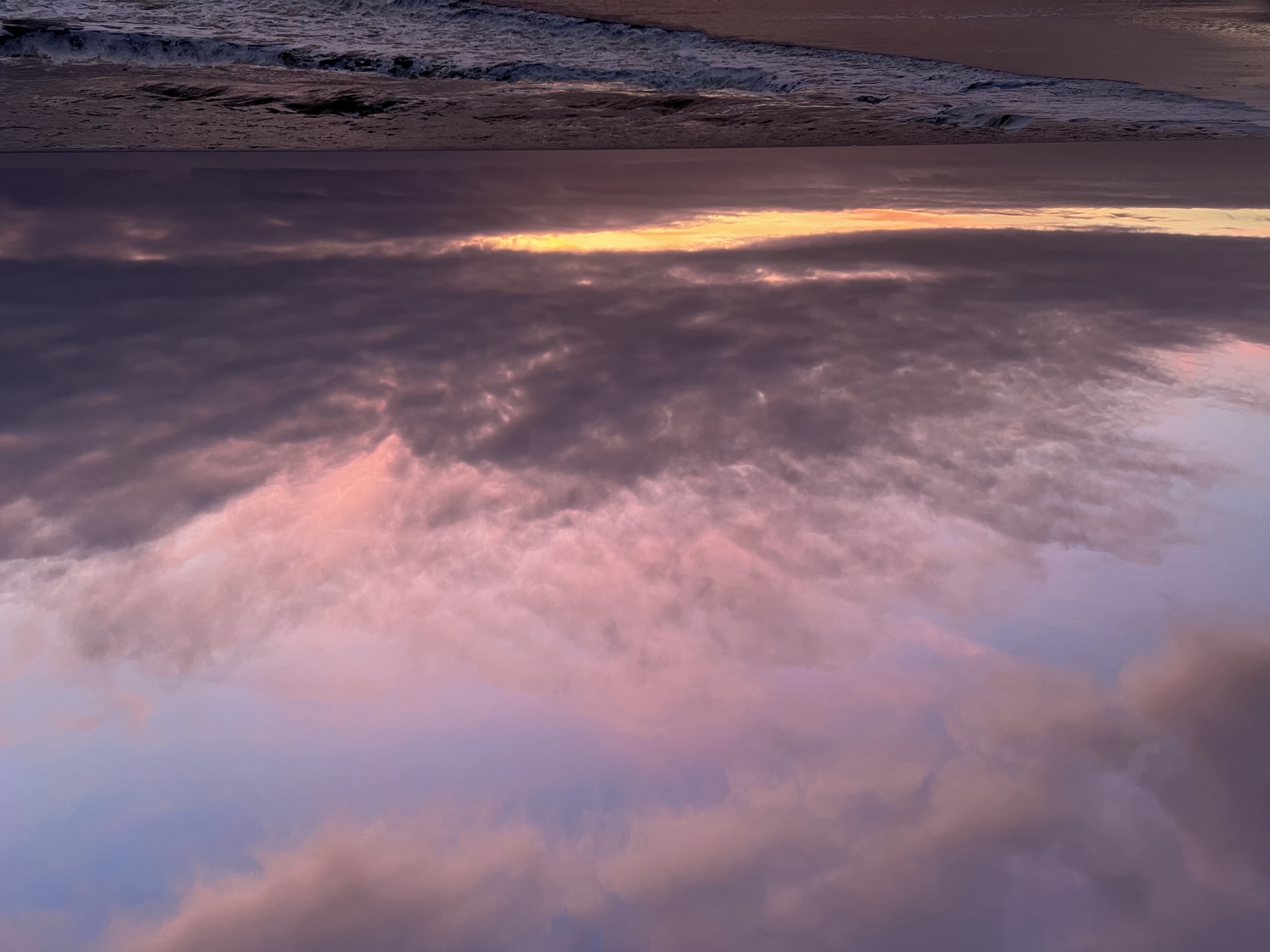 Pink cloud burst at dusk