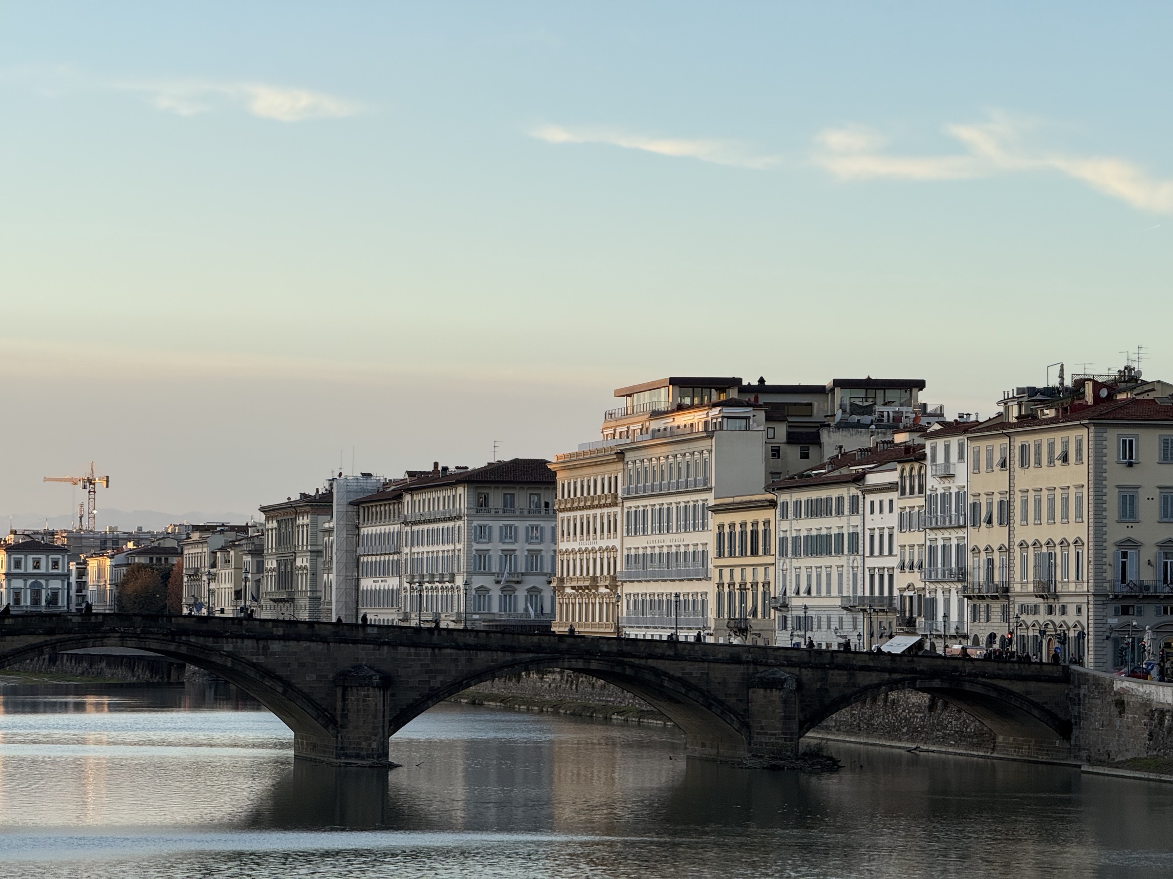 Florence palazzi above bridge at dusk